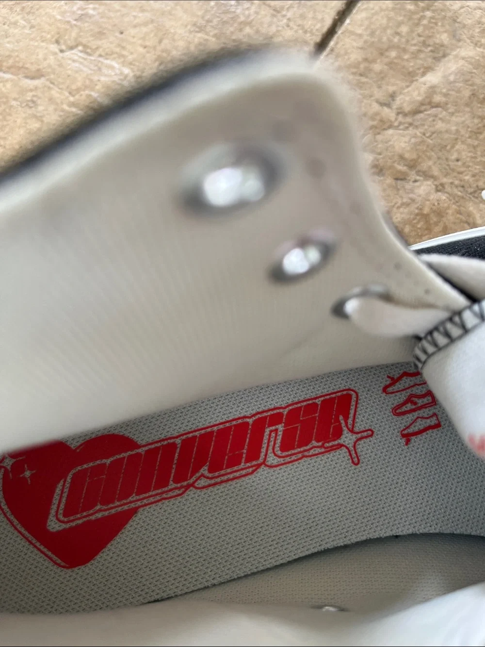Converse Kids Black High-Top Sneakers with White Soles and Red Heart Details